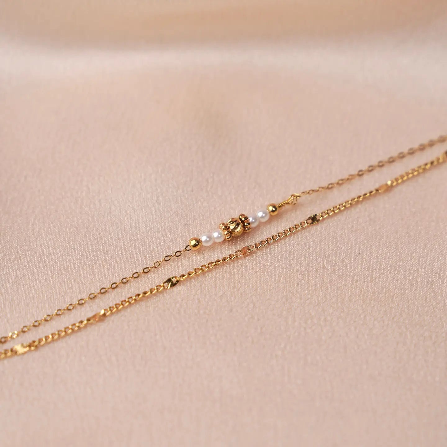 Dubbele armband met witte parels