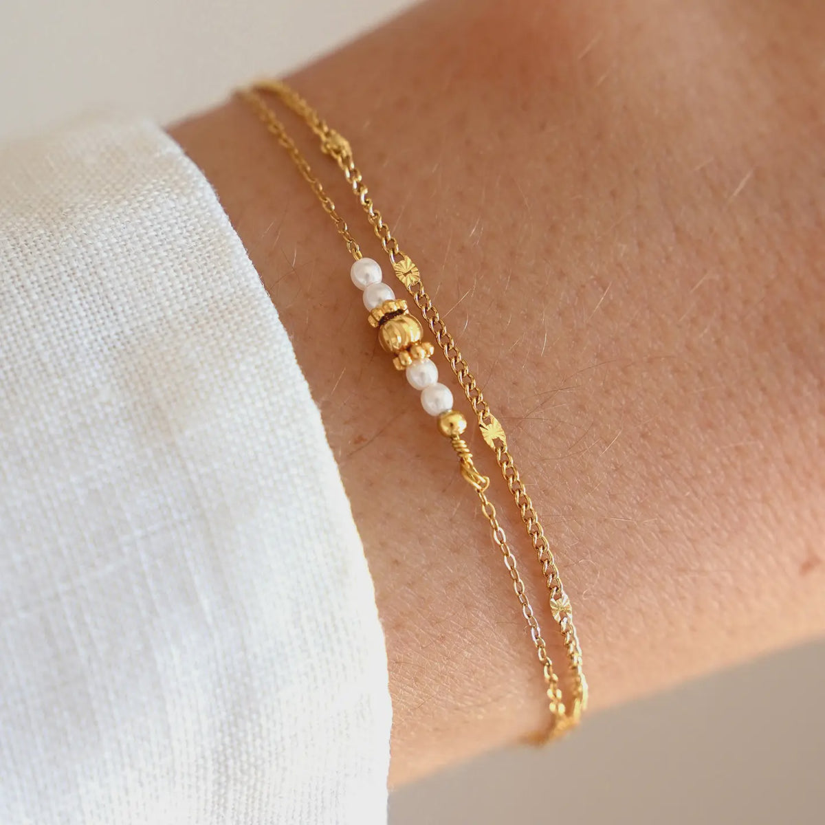Dubbele armband met witte parels