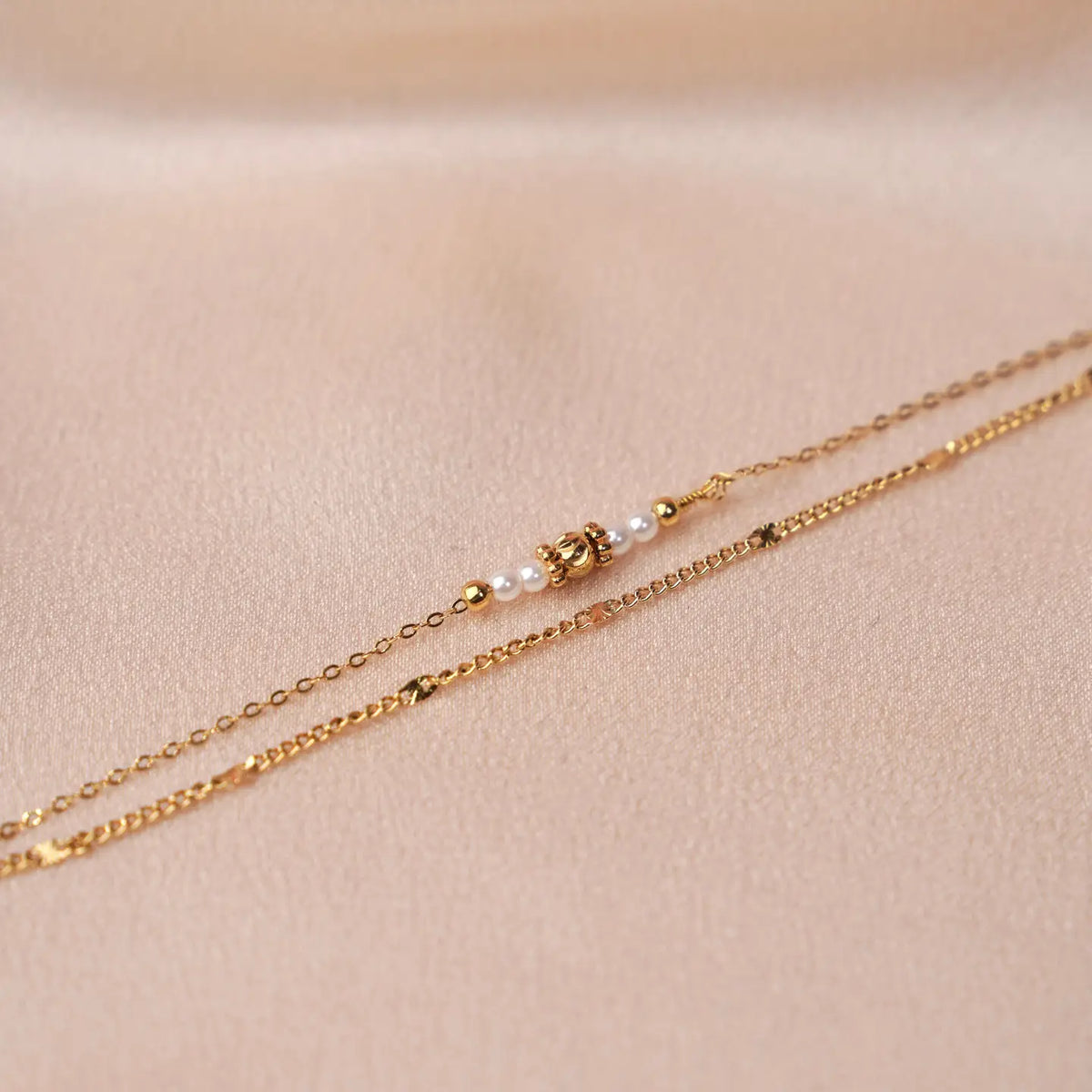 Dubbele armband met witte parels